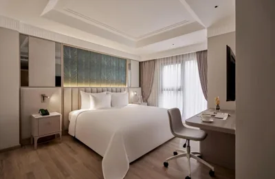 Habitación Deluxe comunicada — La Siesta Premium Saigon Central
