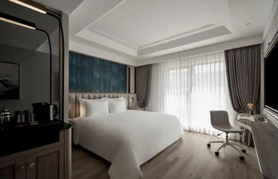Habitación Deluxe — La Siesta Premium Saigon Central